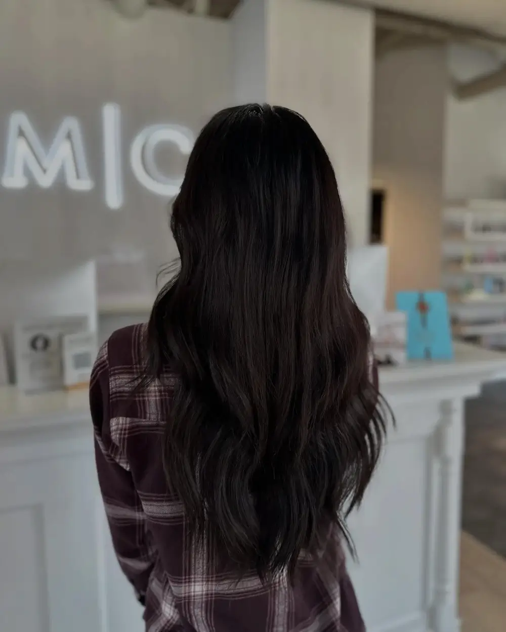 Bellami weft hair extensions blended for added length and fullness at Michele Coulter Salon in Milton GA
