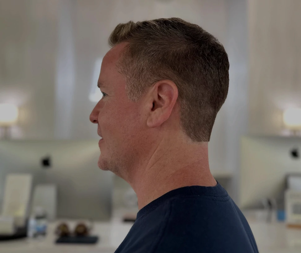 Men's short haircut side view at Michele Coulter Salon in Milton GA